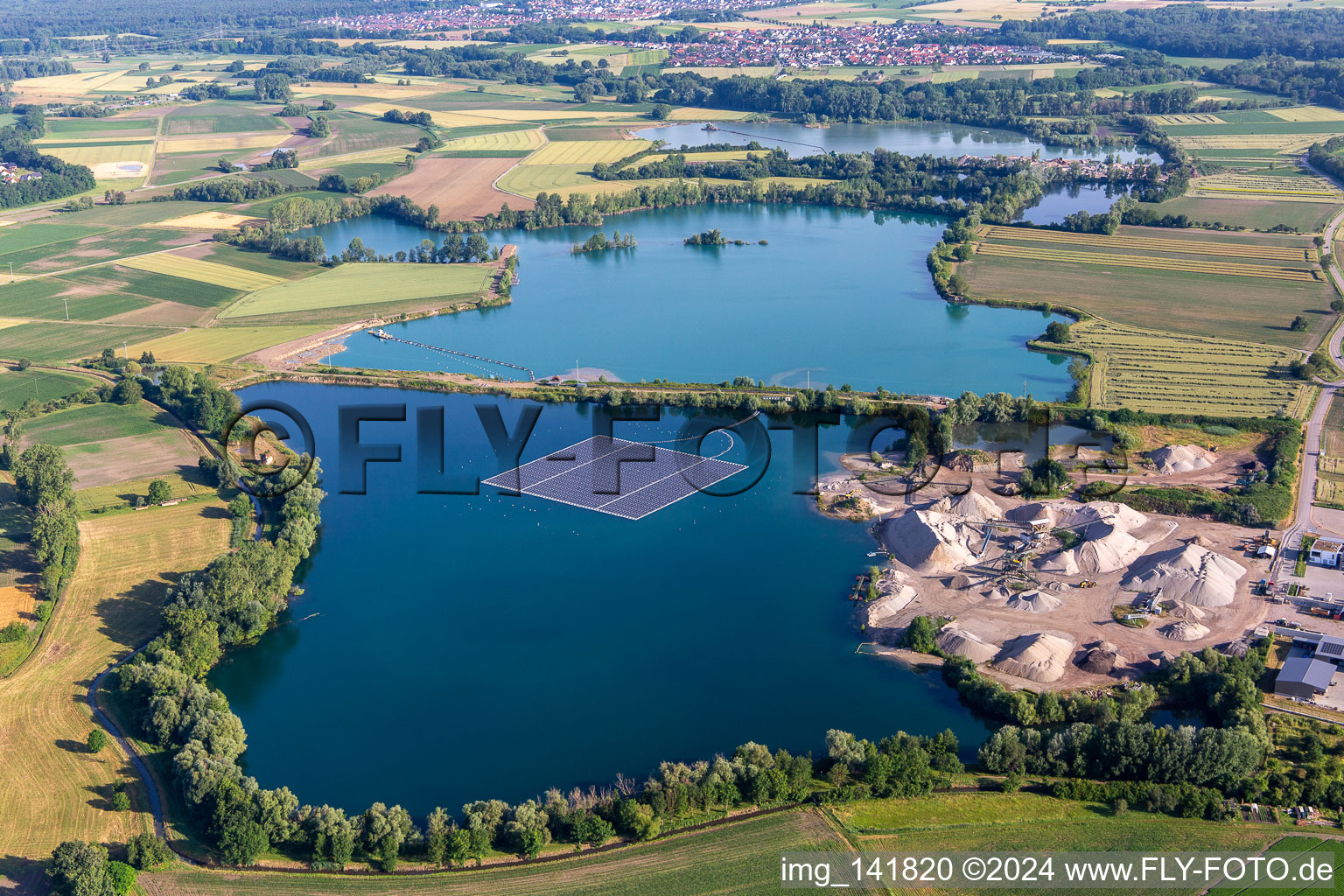 Aerial view of Floating solar park on a lake in Leimersheim in the state Rhineland-Palatinate, Germany