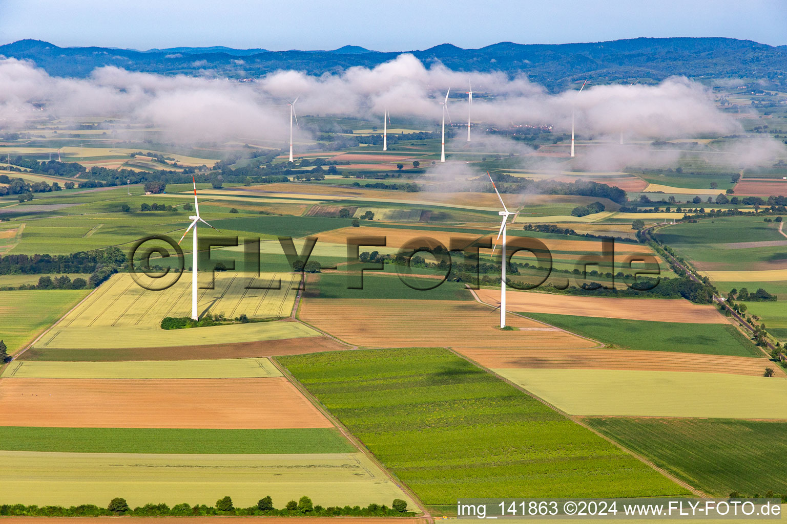 Wind farm Minfeld (in the background wind farm Freckenfeld) from the east in low clouds in Minfeld in the state Rhineland-Palatinate, Germany