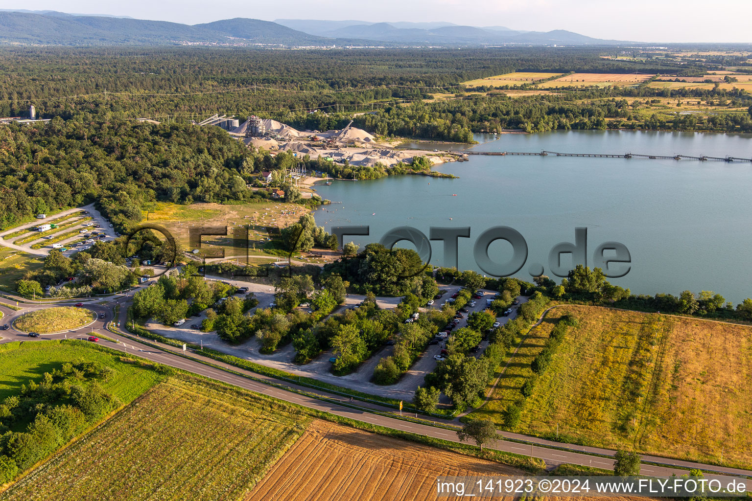 Parking lot at Epplesee from the north in the district Silberstreifen in Rheinstetten in the state Baden-Wuerttemberg, Germany