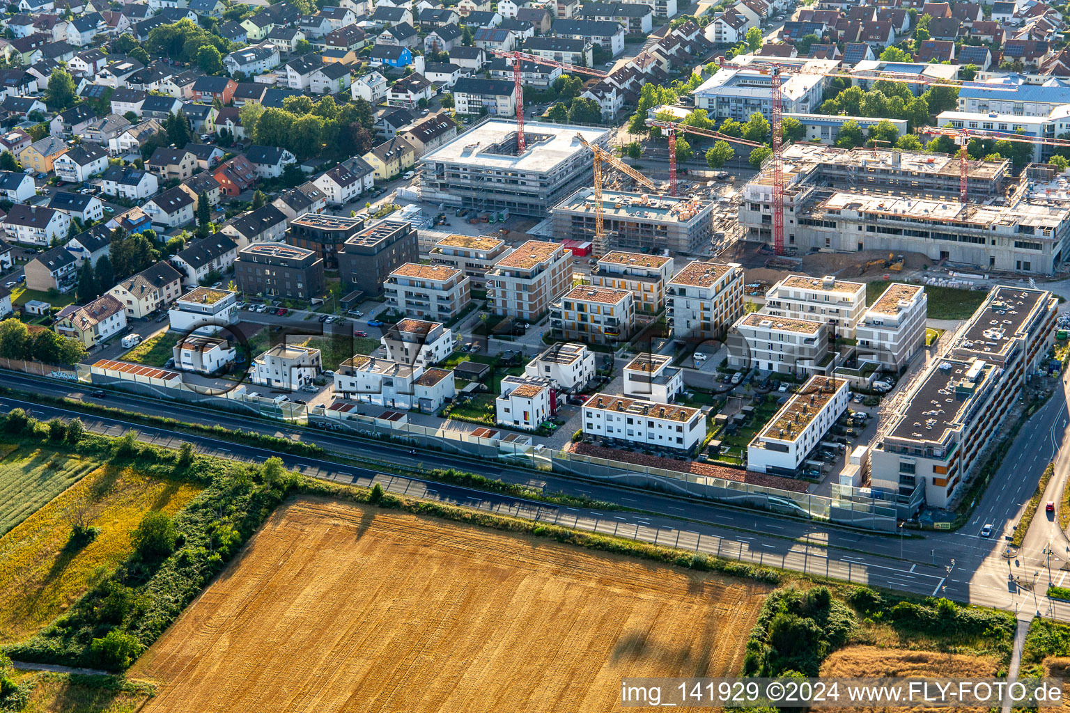 Aerial view of Multi-family house construction site "New City Centre" from the east in the district Mörsch in Rheinstetten in the state Baden-Wuerttemberg, Germany