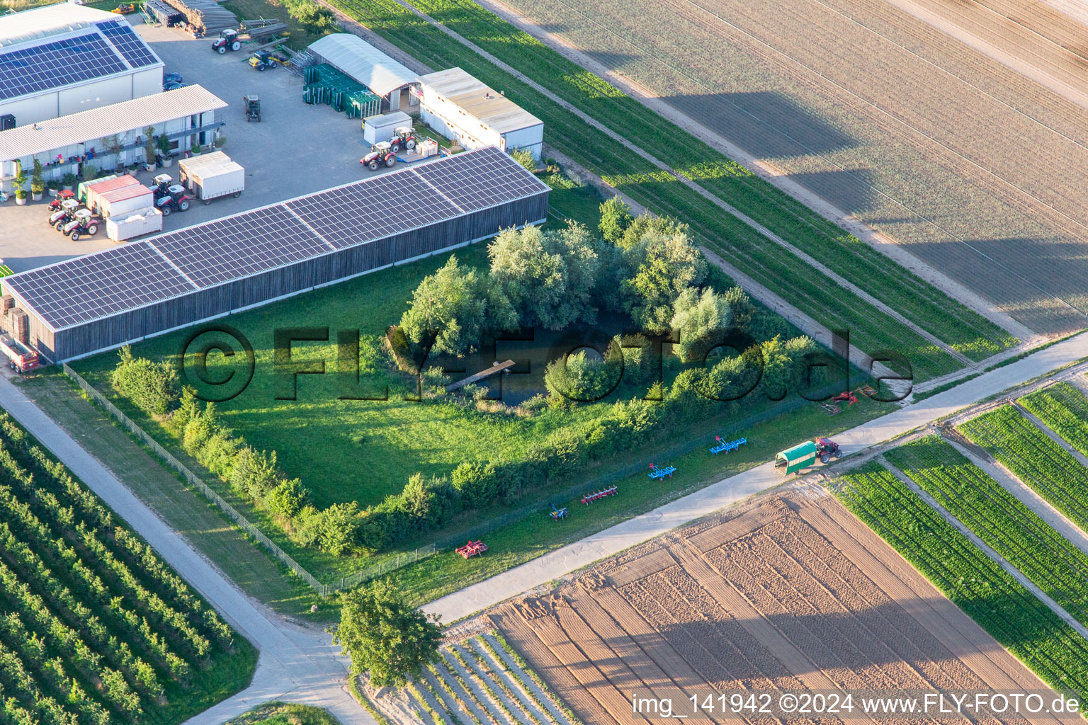 Farmer's garden with natural pond in Winden in the state Rhineland-Palatinate, Germany