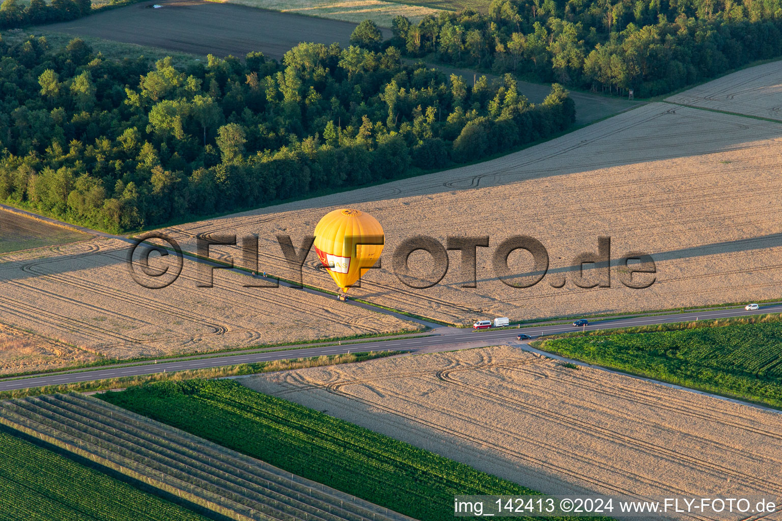 Landing of two hot air balloons "Pfalzgas in Winden in the state Rhineland-Palatinate, Germany