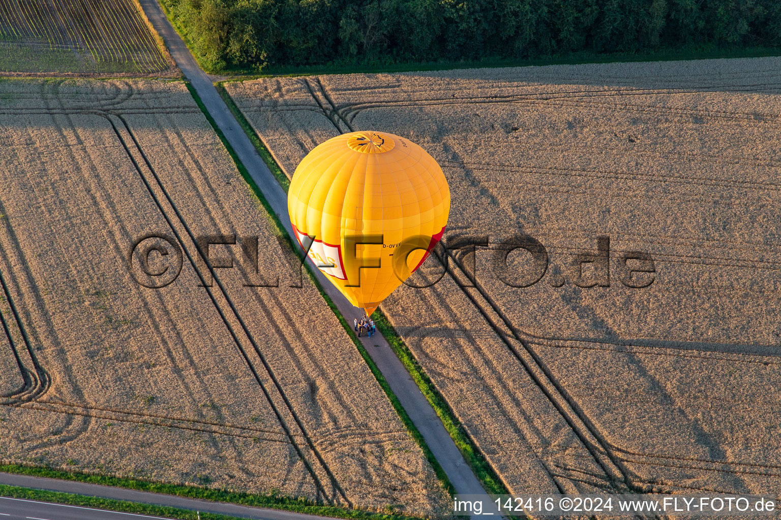 Aerial view of Landing of two hot air balloons "Pfalzgas in Winden in the state Rhineland-Palatinate, Germany