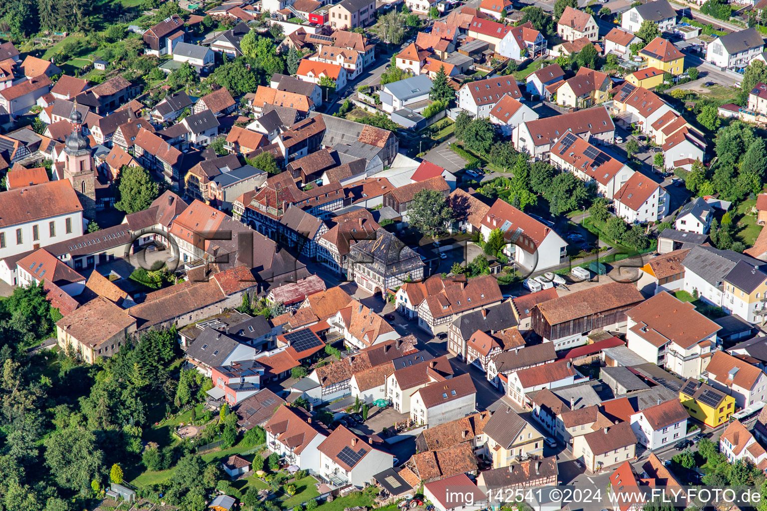 Main street with half-timbered houses in Rheinzabern in the state Rhineland-Palatinate, Germany