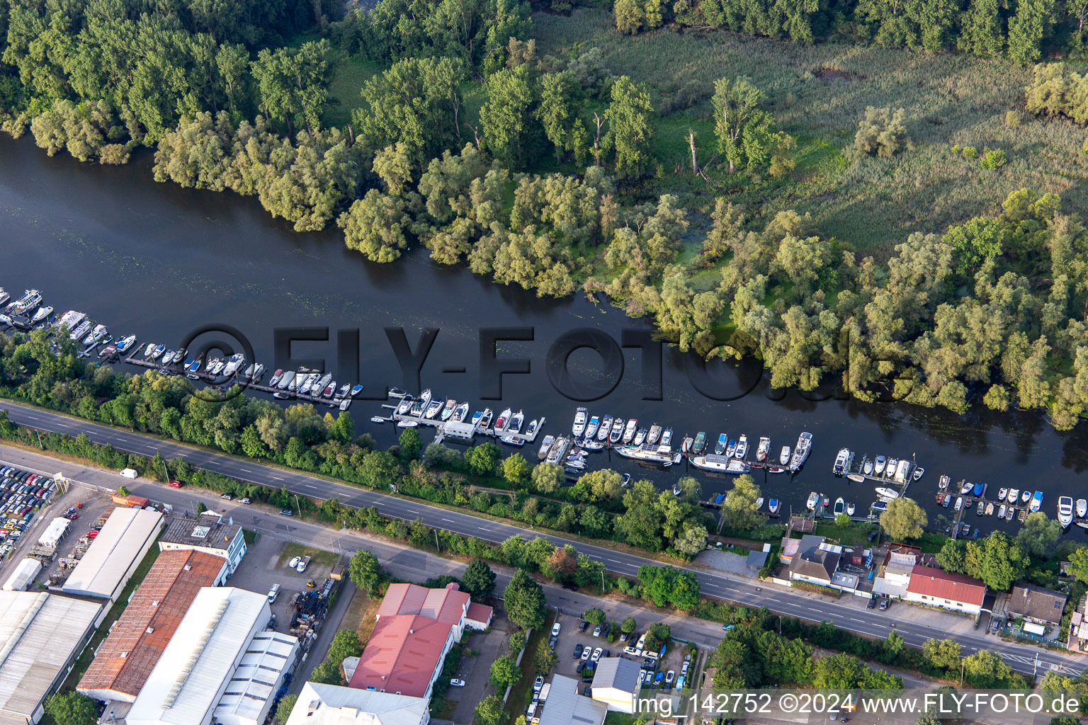 Boat piers of the industrial area- jetty community GbR on the Lampertheim Altrhein in Lampertheim in the state Hesse, Germany