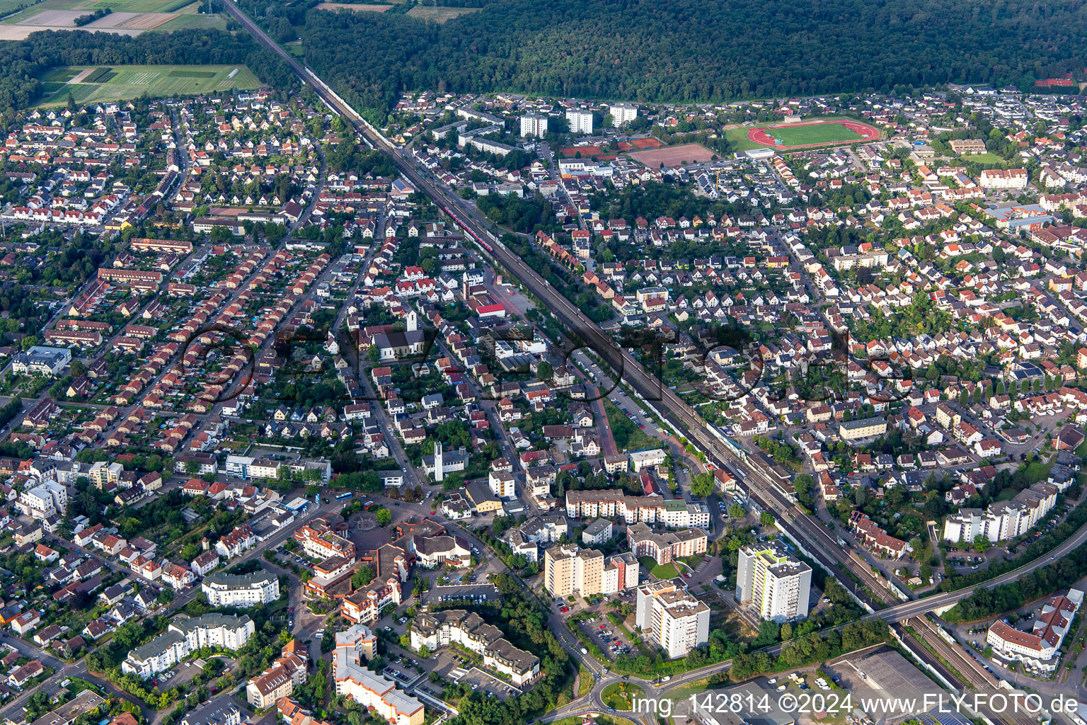 The railway line divides the town in Limburgerhof in the state Rhineland-Palatinate, Germany