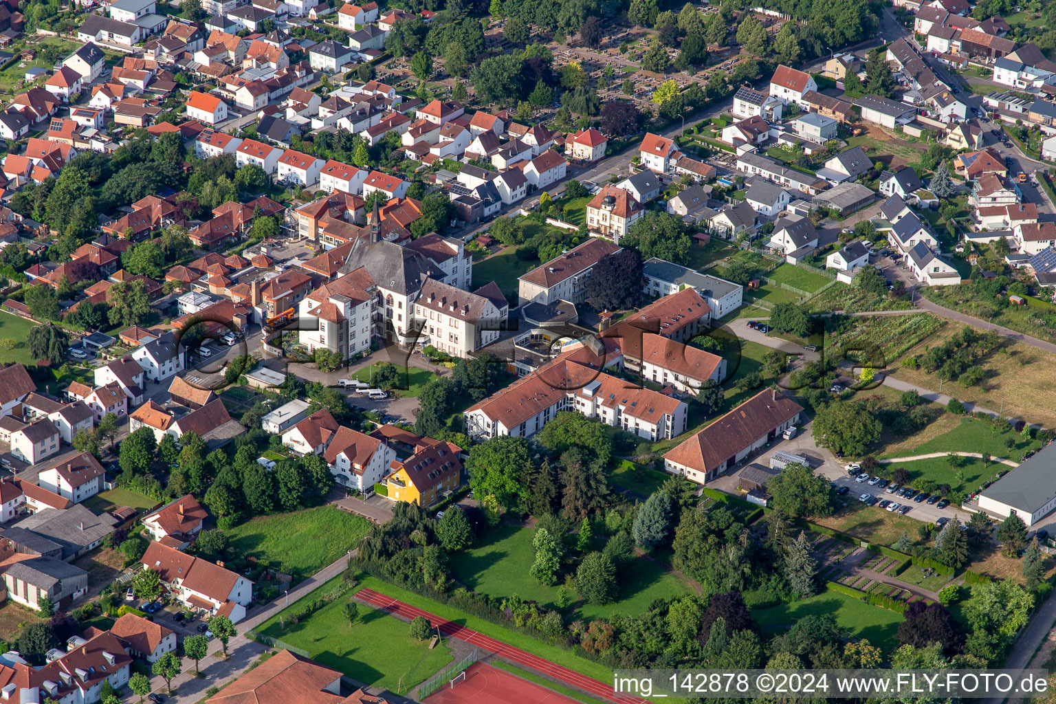 St. Paulus Stift Herxheim in Herxheim bei Landau in the state Rhineland-Palatinate, Germany from above