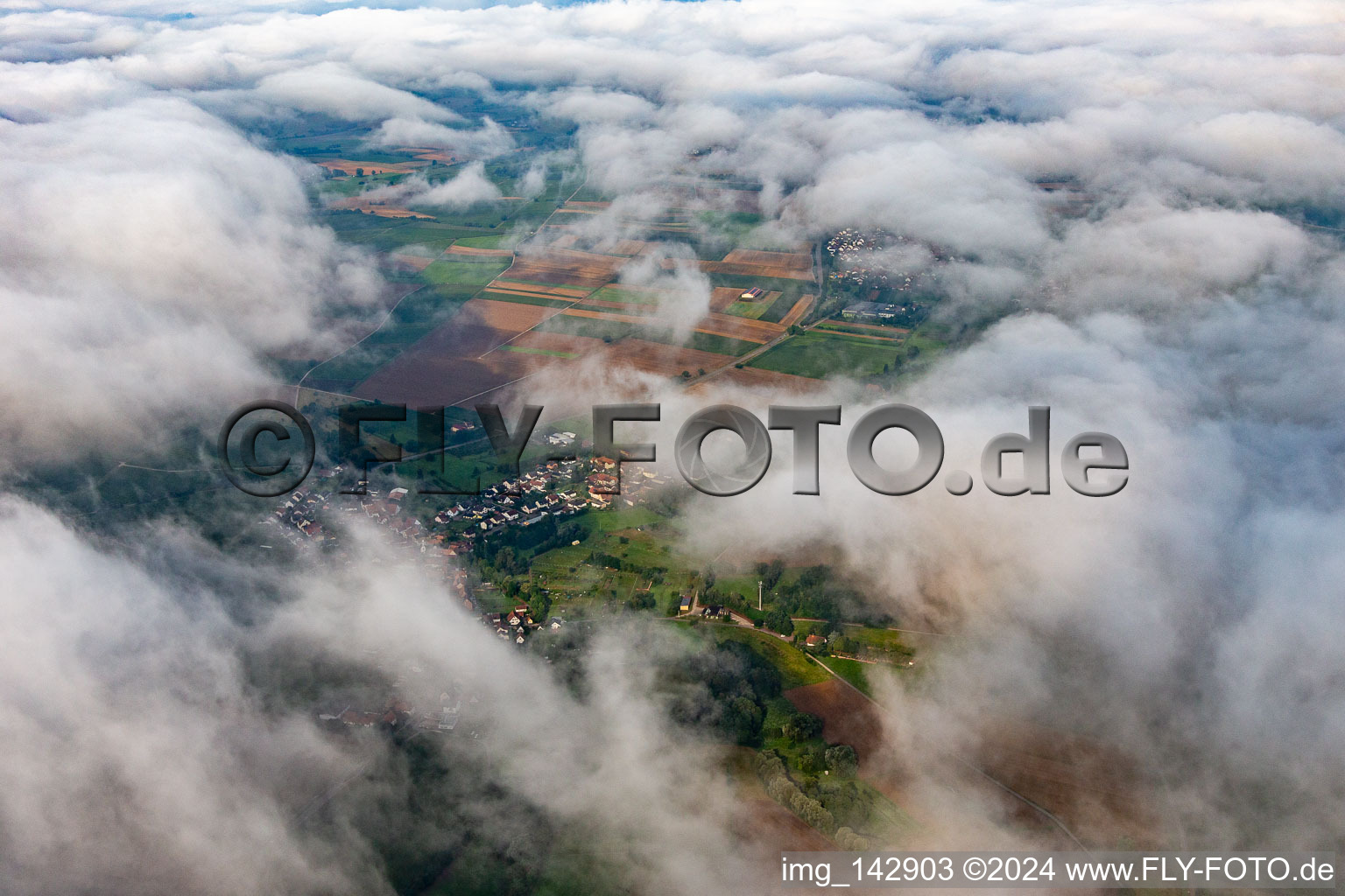 Aerial view of Village from northeast under clouds in Oberhausen in the state Rhineland-Palatinate, Germany