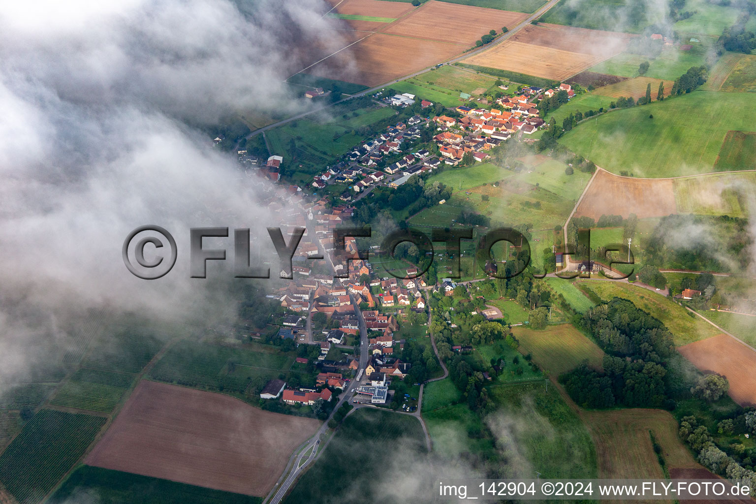 Village from the east under clouds in Oberhausen in the state Rhineland-Palatinate, Germany