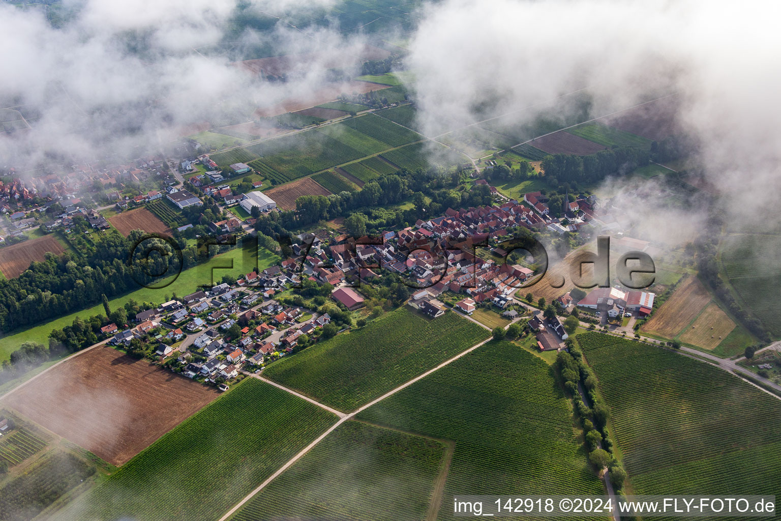 Aerial view of Village at Klingbachtal from the south under clouds in the district Klingen in Heuchelheim-Klingen in the state Rhineland-Palatinate, Germany