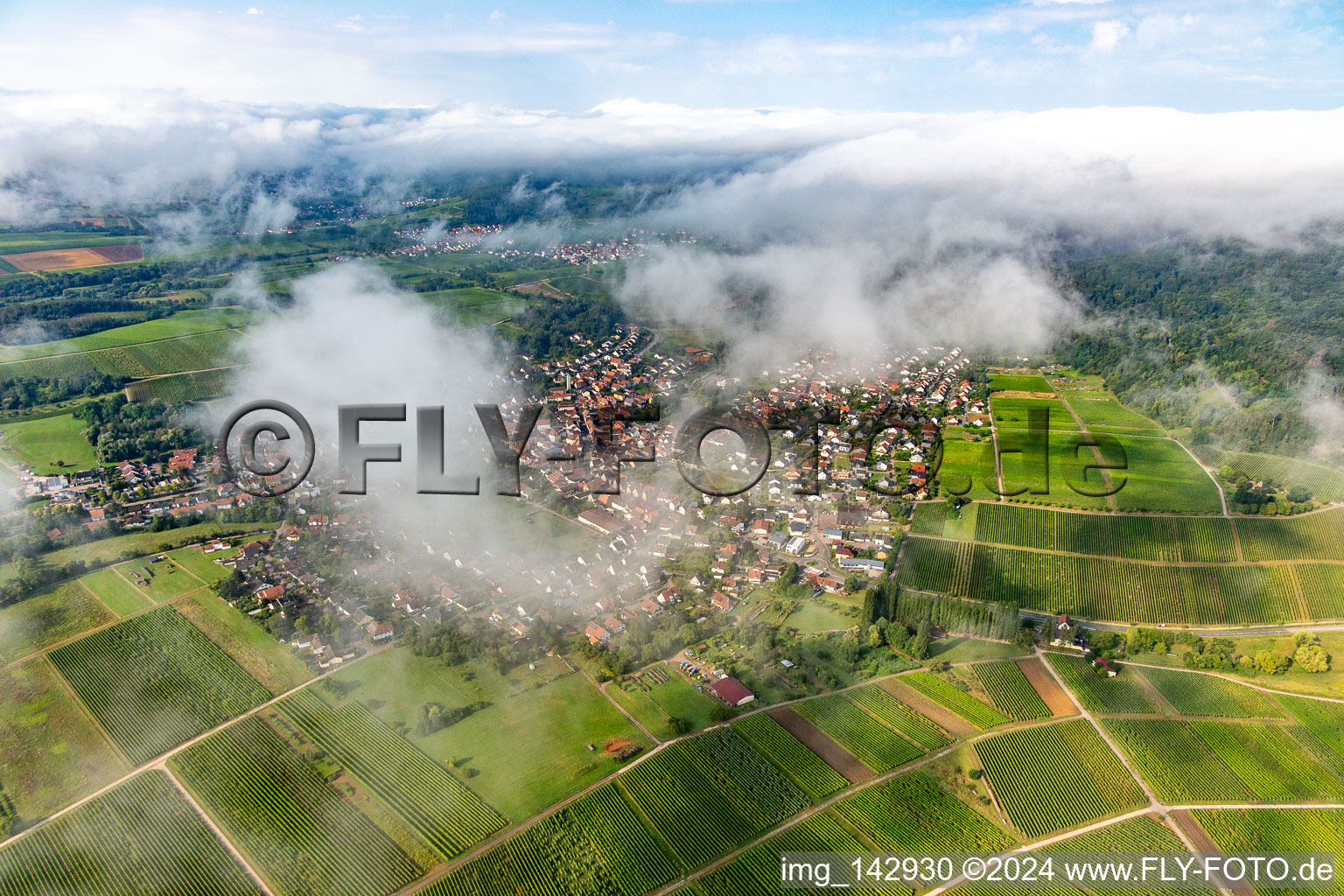 Aerial view of Village from northeast under clouds in Klingenmünster in the state Rhineland-Palatinate, Germany