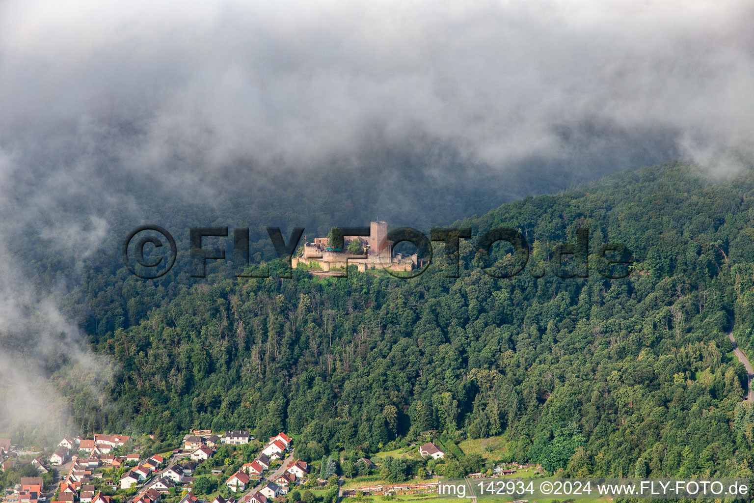 Aerial view of Landeck Castle in the morning under low clouds in Klingenmünster in the state Rhineland-Palatinate, Germany