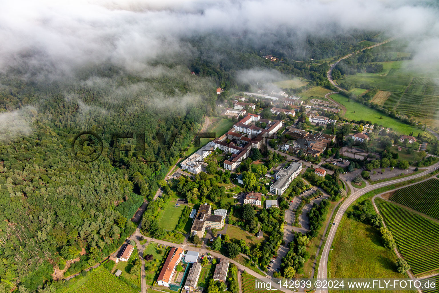 Thick clouds over the Palatinate Hospital for Psychiatry and Neurology in Klingenmünster in the state Rhineland-Palatinate, Germany seen from above