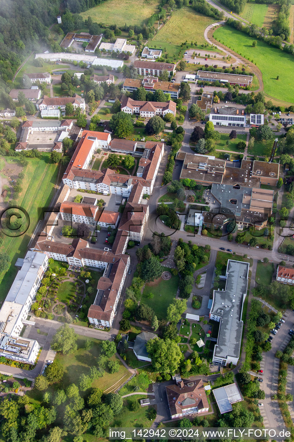 Bird's eye view of Thick clouds over the Palatinate Hospital for Psychiatry and Neurology in Klingenmünster in the state Rhineland-Palatinate, Germany