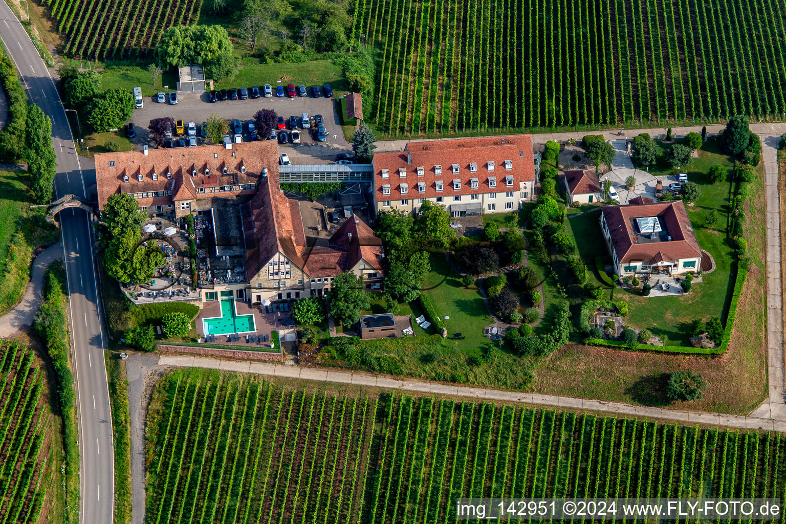 Aerial view of 4-star hotel Leinsweiler courtyard between vineyards in the morning in Leinsweiler in the state Rhineland-Palatinate, Germany