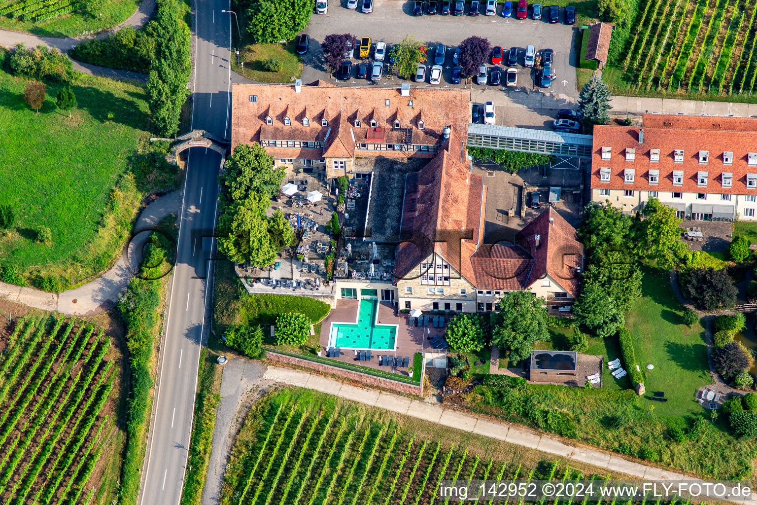 Aerial photograpy of 4-star hotel Leinsweiler courtyard between vineyards in the morning in Leinsweiler in the state Rhineland-Palatinate, Germany