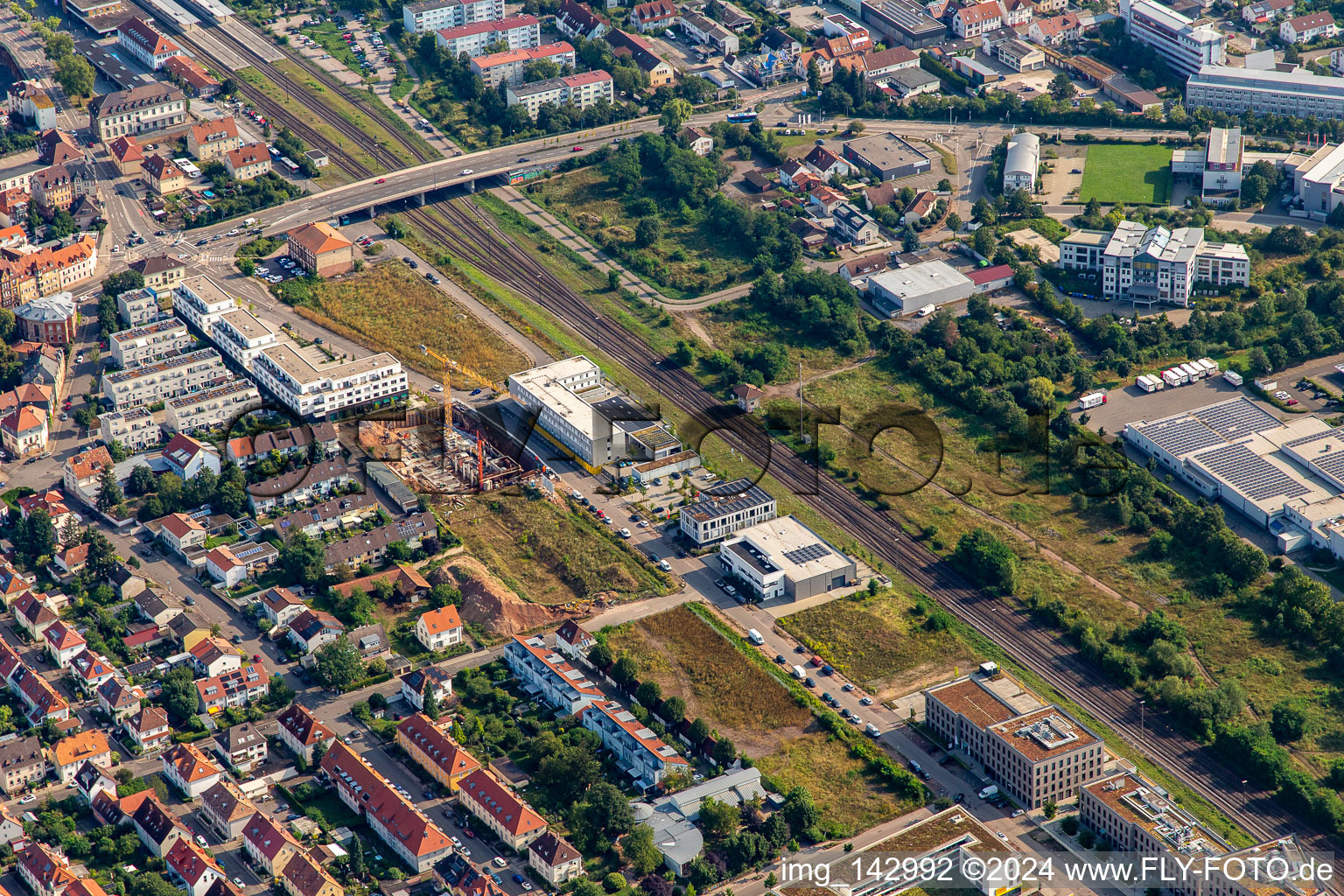 Building of the Police Directorate Police and Criminal Inspection and the Industrial Area Metall Landau on Paul-von-Denis-Straße along the railway line in the district Queichheim in Landau in der Pfalz in the state Rhineland-Palatinate, Germany