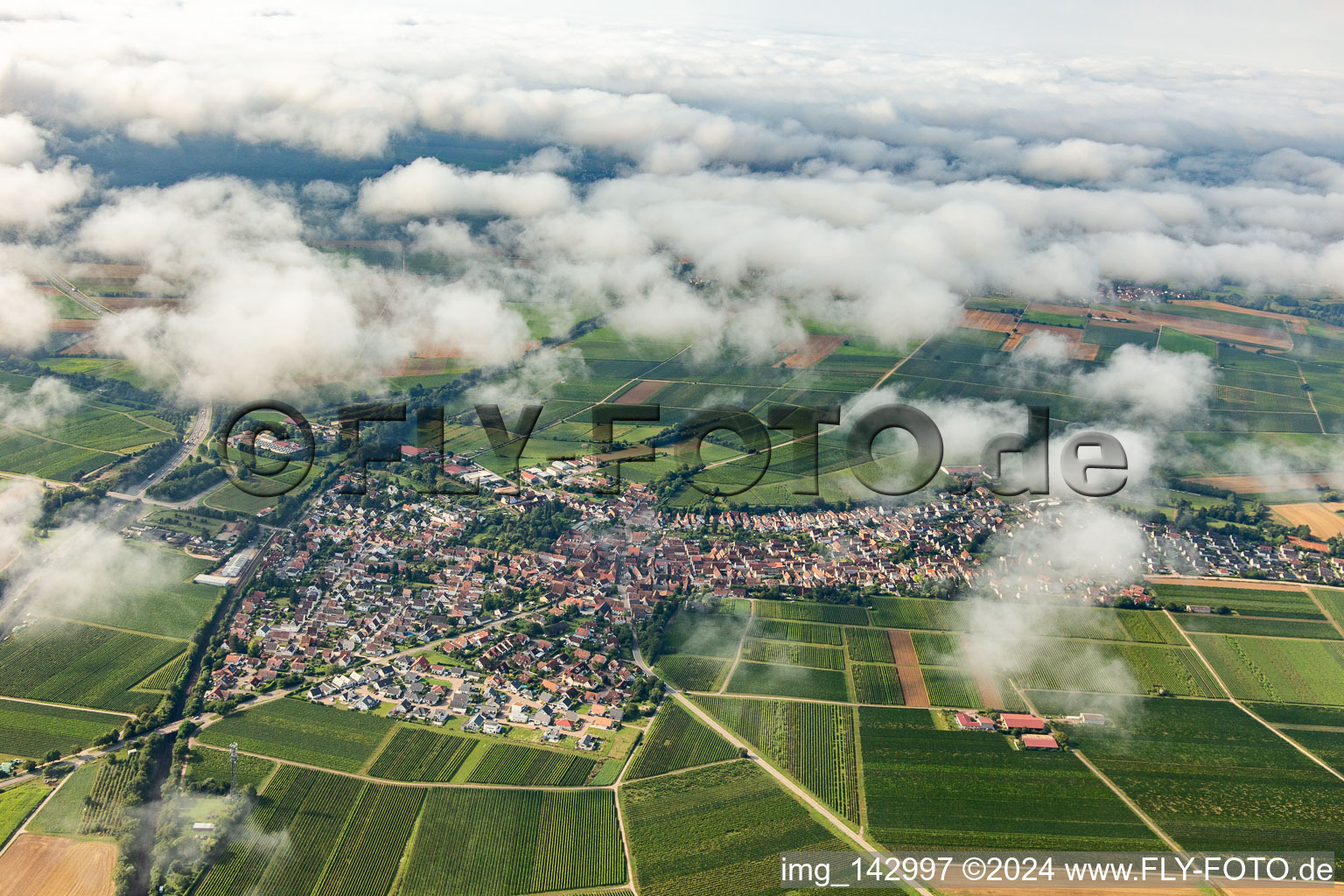 Village under clouds from the north in Insheim in the state Rhineland-Palatinate, Germany