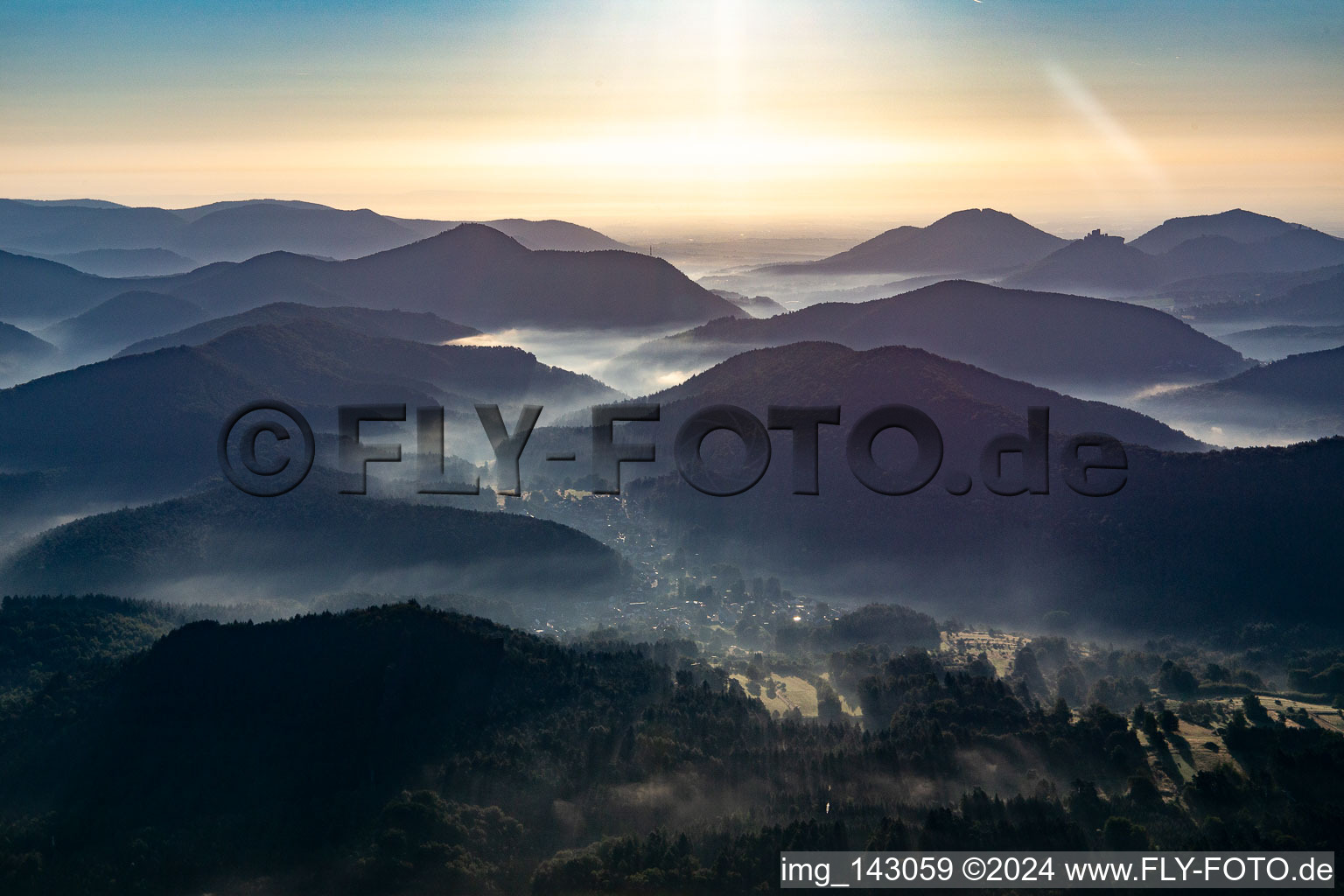 Morning mist in the Queichtal from the west in Spirkelbach in the state Rhineland-Palatinate, Germany