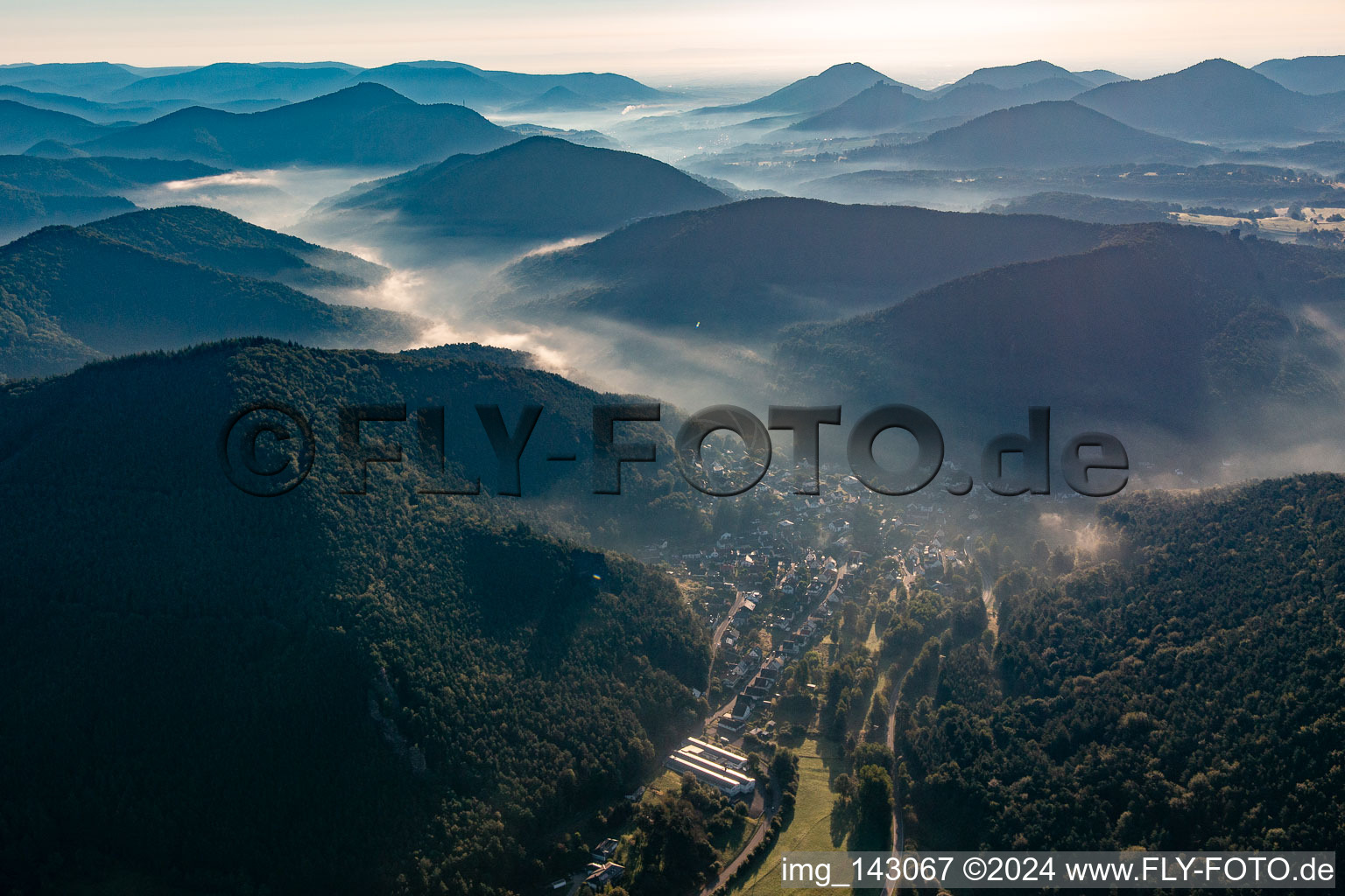 Morning mist in the Queichtal from the west in Lug in the state Rhineland-Palatinate, Germany