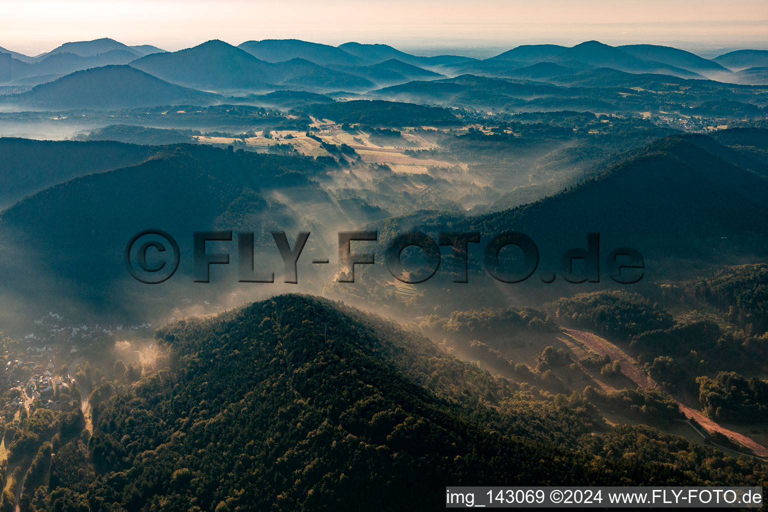 Morning mist in the Palatinate Forest from the north in Oberschlettenbach in the state Rhineland-Palatinate, Germany