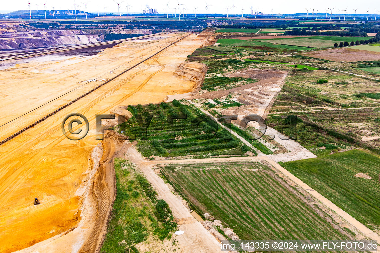 Demolition edge of the Garzweiler open-cast lignite mine in the district Immerath in Erkelenz in the state North Rhine-Westphalia, Germany