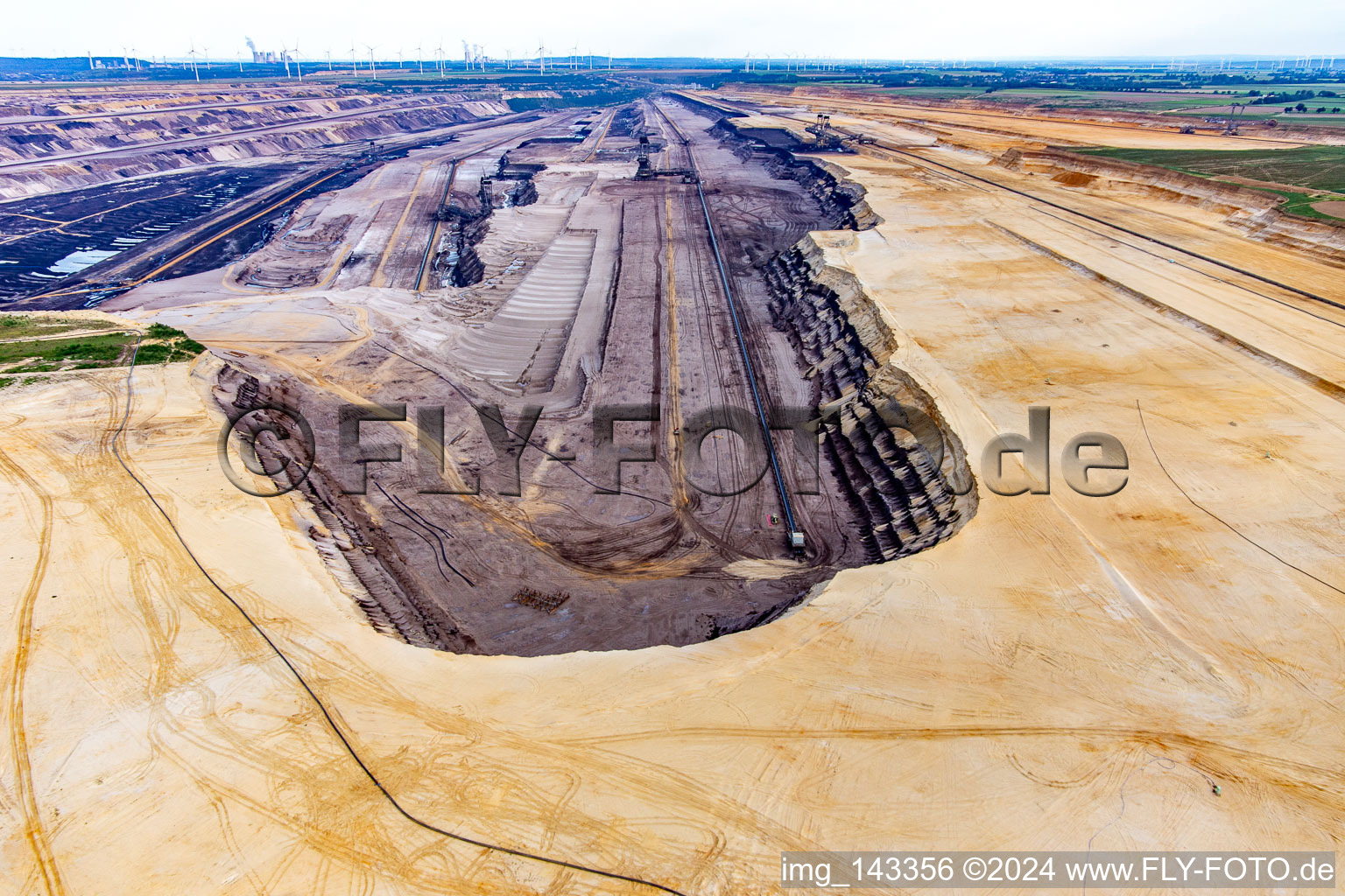 Aerial view of View of the Garzweiler opencast lignite mine from the north in the district Borschemich in Erkelenz in the state North Rhine-Westphalia, Germany