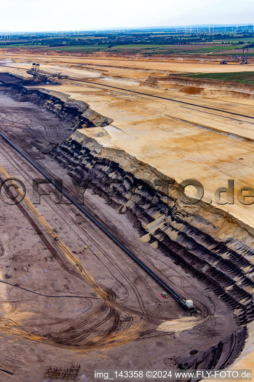 Aerial photograpy of View of the Garzweiler opencast lignite mine from the north in the district Borschemich in Erkelenz in the state North Rhine-Westphalia, Germany