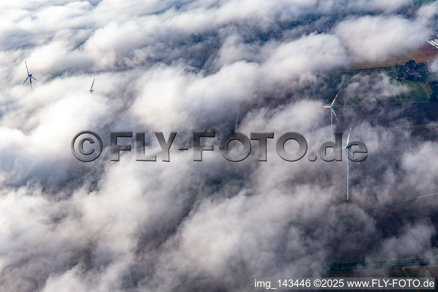 Aerial view of Wind farm at Minfeld partly in clouds in Minfeld in the state Rhineland-Palatinate, Germany