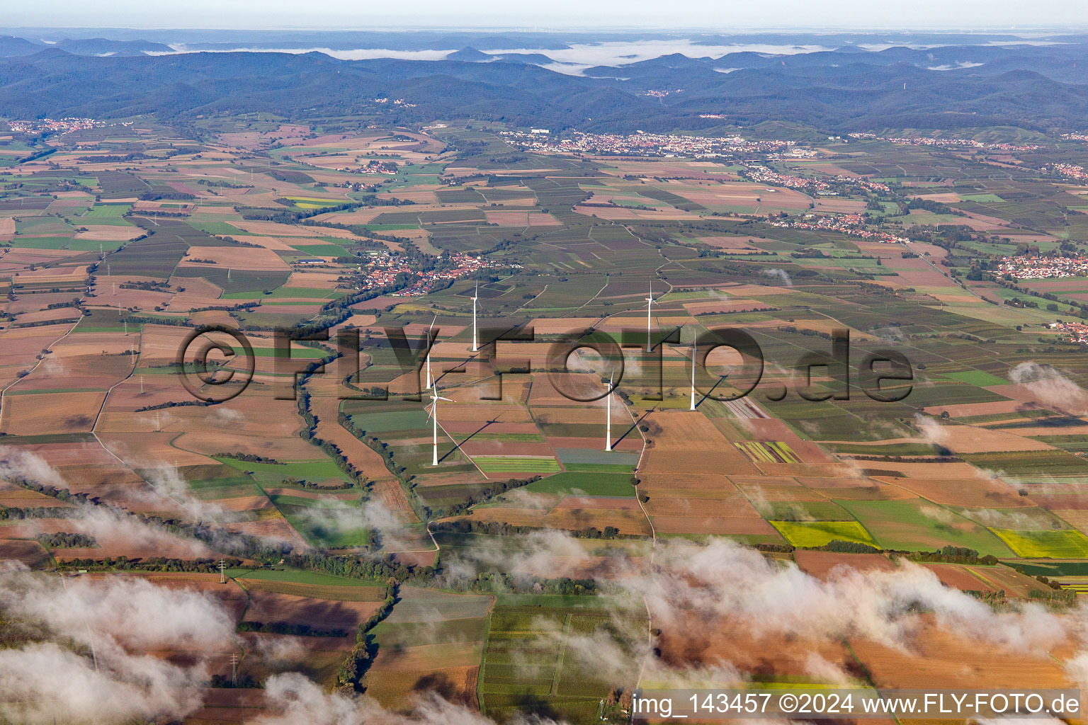 Wind farm at Freckenfeld with clouds in Freckenfeld in the state Rhineland-Palatinate, Germany