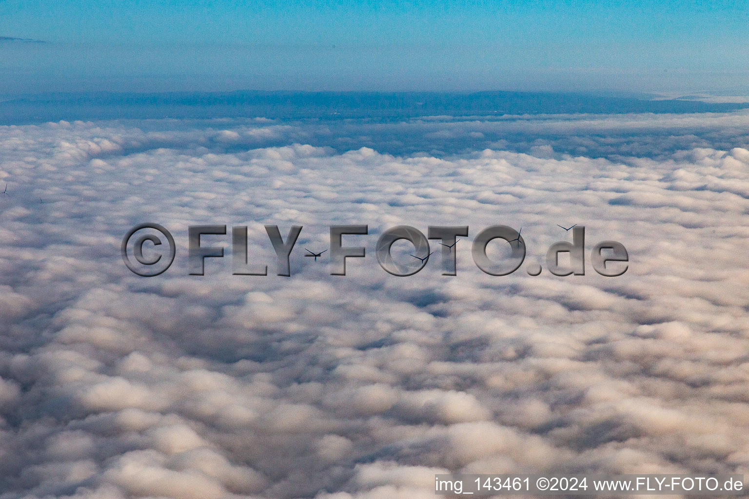 Aerial photograpy of Rotors of the wind farm near Offenbach rise above the low clouds in Offenbach an der Queich in the state Rhineland-Palatinate, Germany