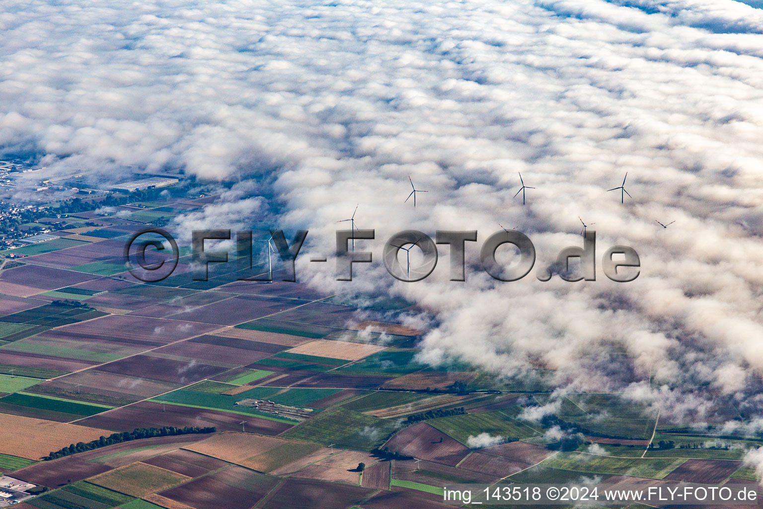 Wind farm near Offenbach partly in clouds in Offenbach an der Queich in the state Rhineland-Palatinate, Germany