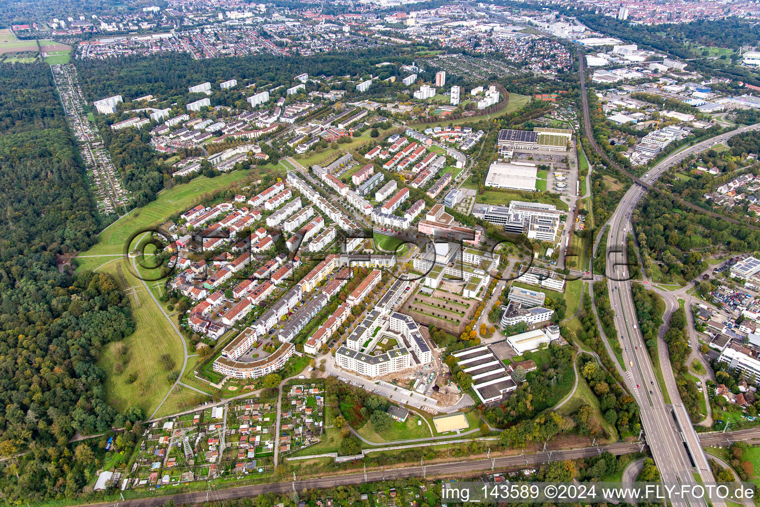 District between forest, railway and motorway access in the district Oberreut in Karlsruhe in the state Baden-Wuerttemberg, Germany