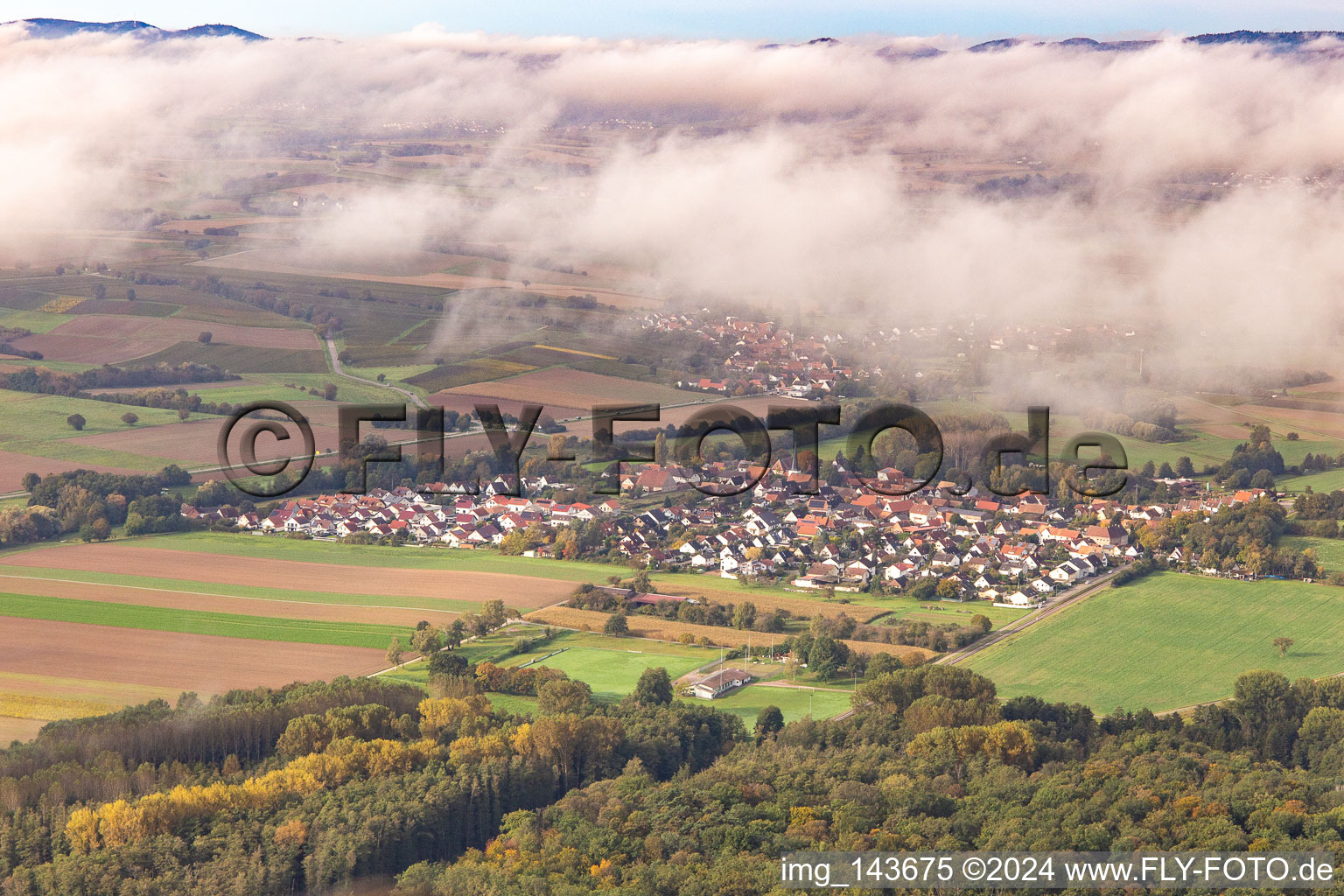 Village under autumn clouds in Barbelroth in the state Rhineland-Palatinate, Germany