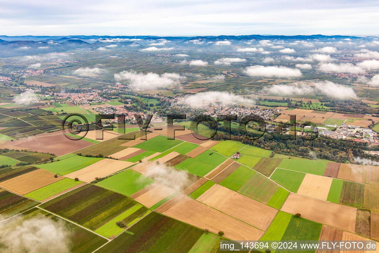 Village under autumn clouds in the district Mühlhofen in Billigheim-Ingenheim in the state Rhineland-Palatinate, Germany