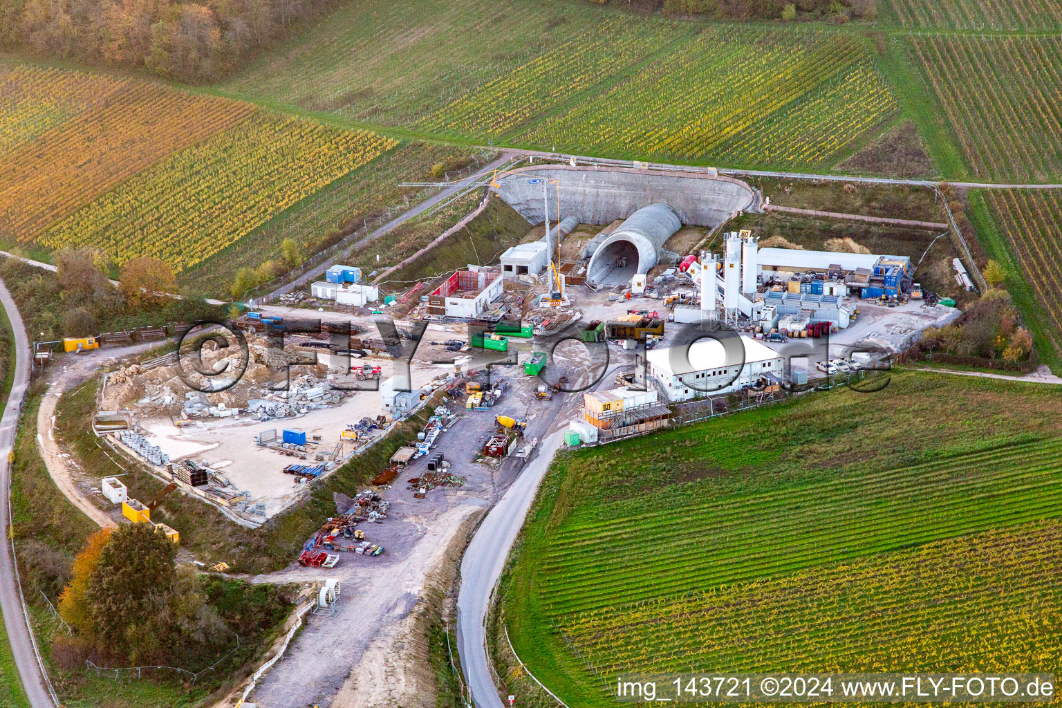 Construction site of the eastern tunnel portal for the Astrid Tunnel for the underpass and bypass of Bad Bergzabern between B38 (Weinstraße) and B427 (Kurtalstraße) in Dörrenbach in the state Rhineland-Palatinate, Germany viewn from the air