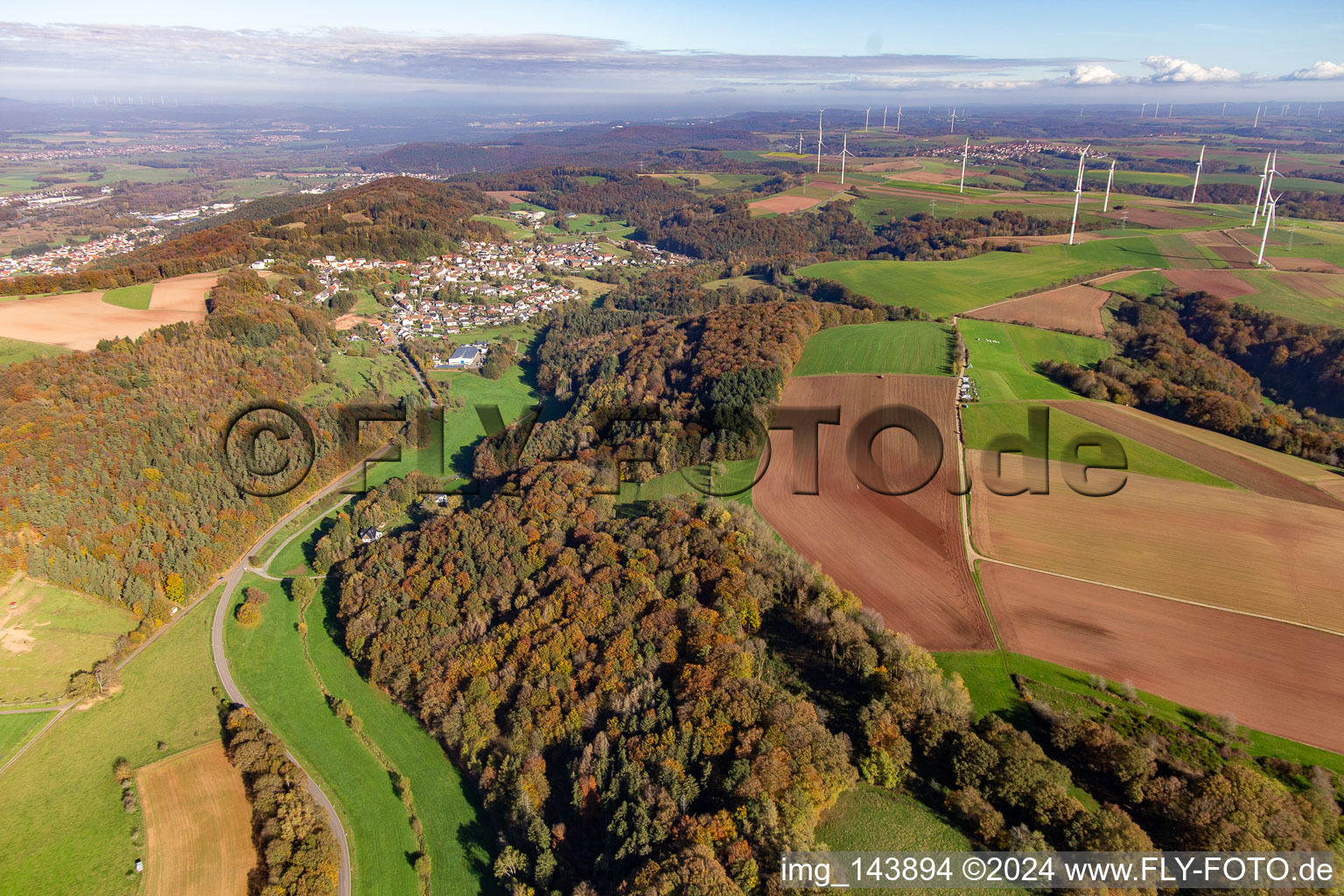Village from the southwest below the Sickinger Höhe wind farm in Lambsborn in the state Rhineland-Palatinate, Germany