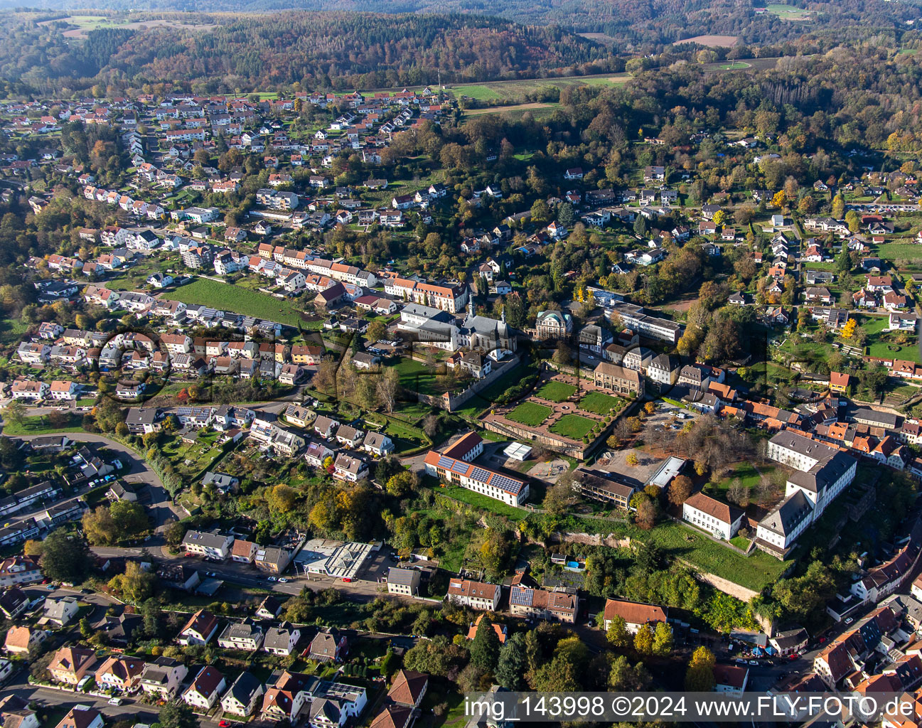 St. Anna and St. Philipp (castle church), orangery and baroque castle above the city in Blieskastel in the state Saarland, Germany from above