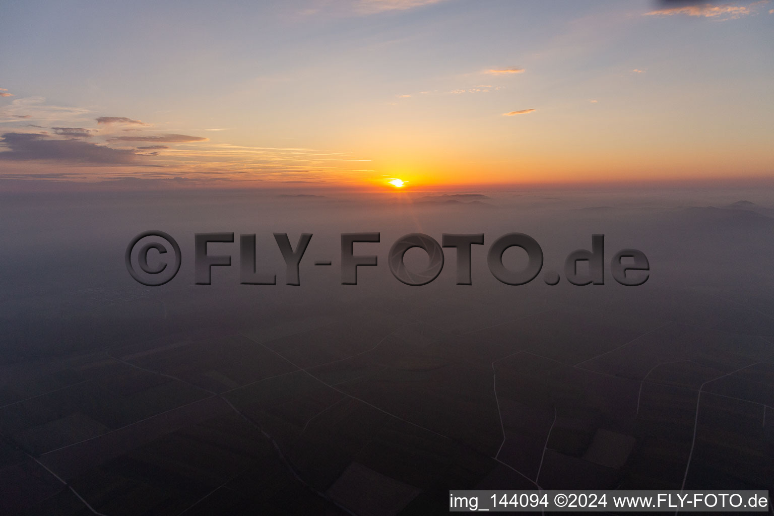 Aerial view of Sunset over the Northern Vosges and the Palatinate Forest in Wissembourg in the state Bas-Rhin, France
