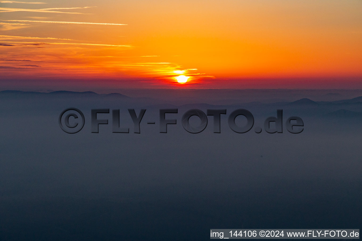 Sunset over the Northern Vosges and the Palatinate Forest in Wissembourg in the state Bas-Rhin, France from above