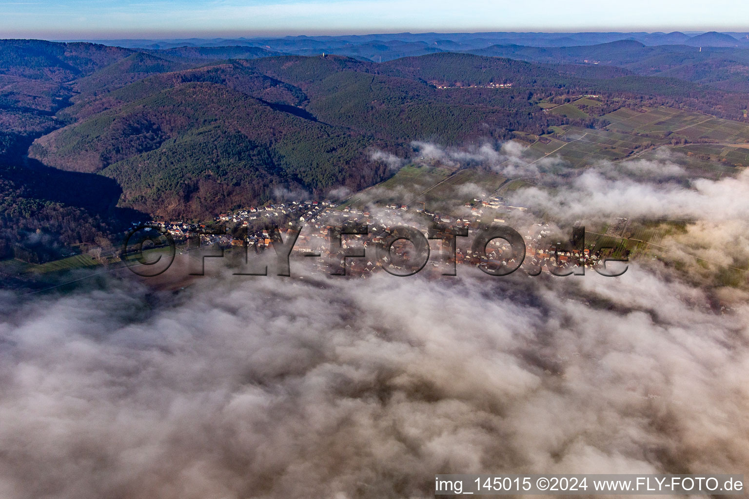 Village on the edge of the clouds in Oberotterbach in the state Rhineland-Palatinate, Germany