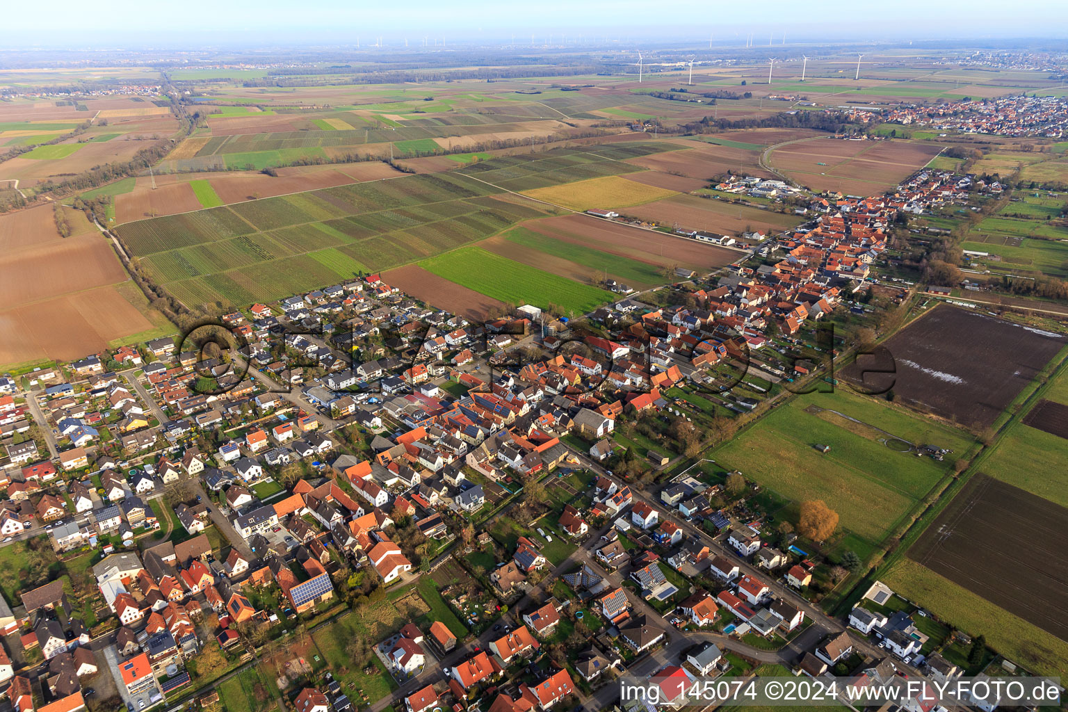 Aerial view of View of the town from the southwest in Freckenfeld in the state Rhineland-Palatinate, Germany