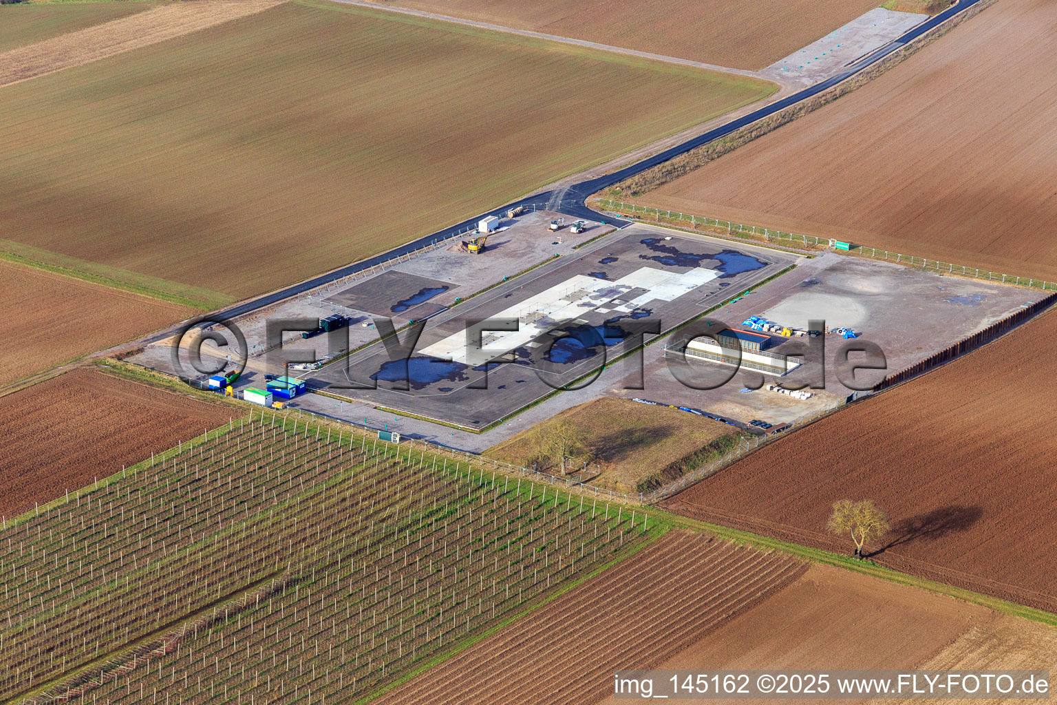 Bird's eye view of Construction site of the V20 deep drilling site of Vulcan Energy at Schleidberg for the extraction of geothermal energy and lithium in Insheim in the state Rhineland-Palatinate, Germany