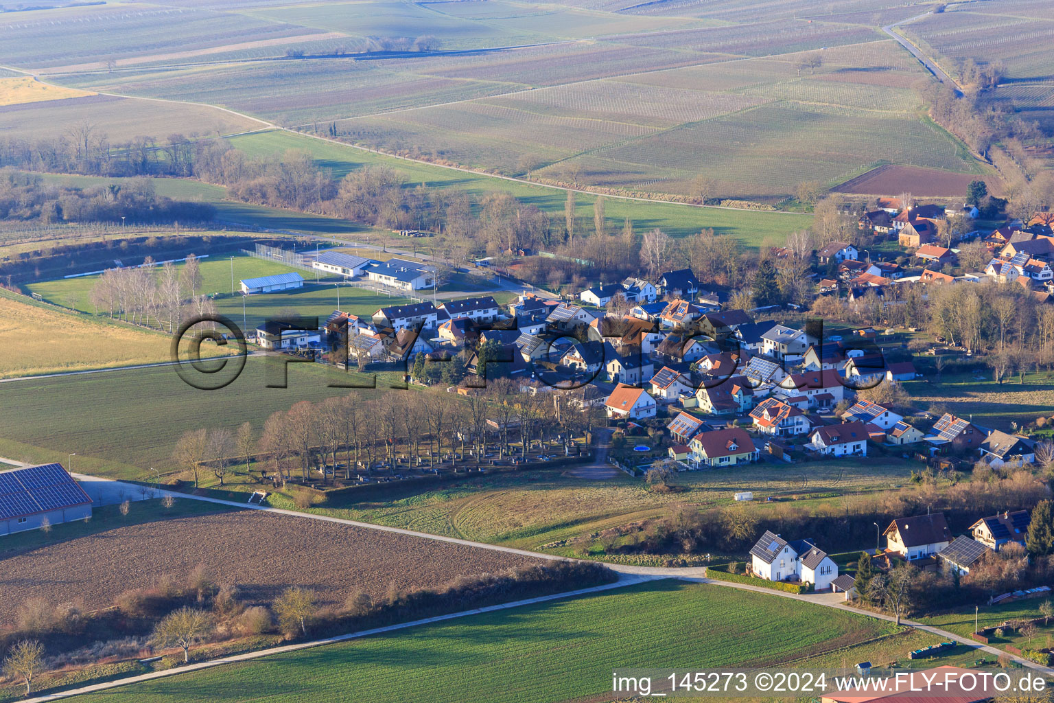 Wasgaustraße and sports field at Dierbachalle in Dierbach in the state Rhineland-Palatinate, Germany