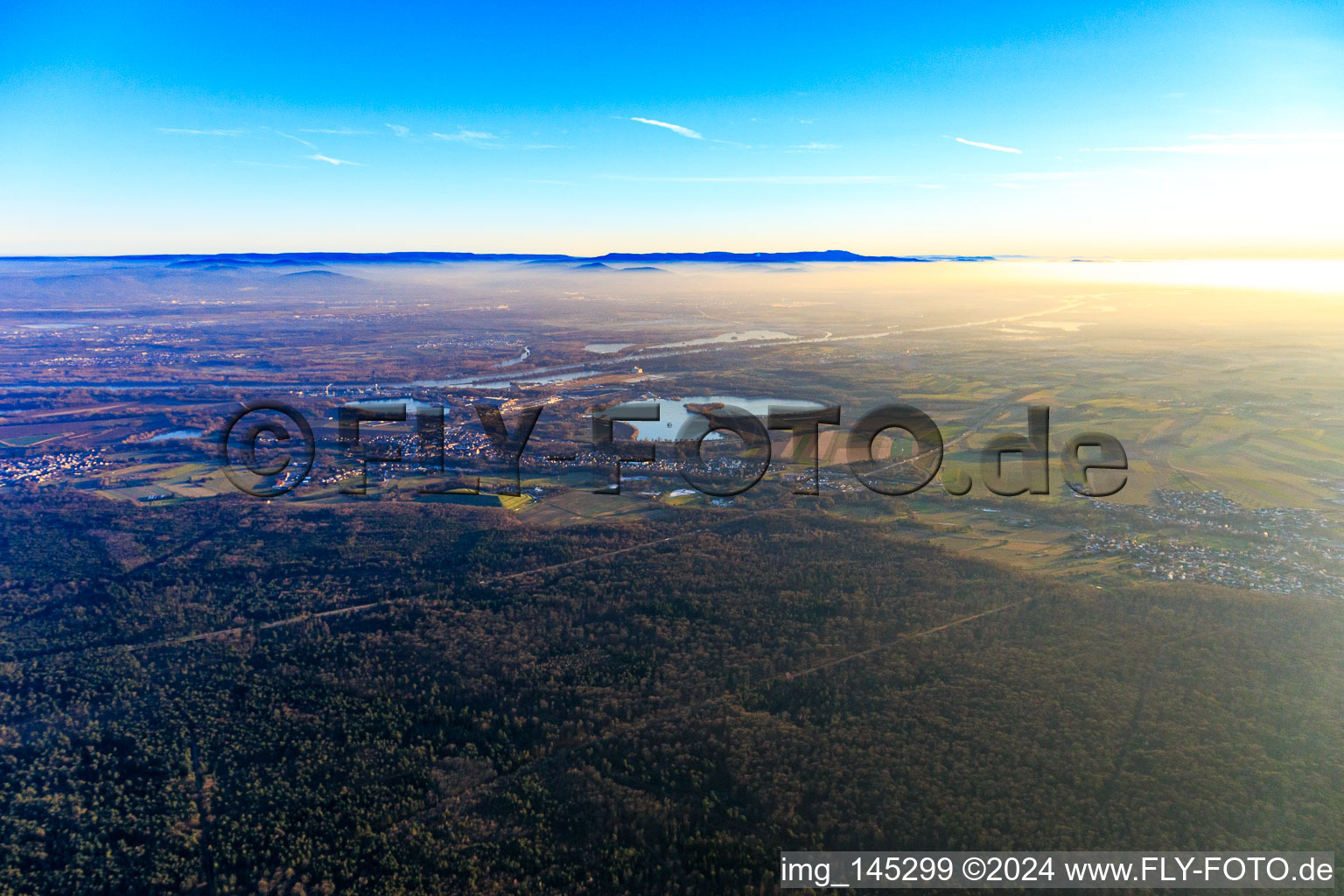 City view from the north under the winter inversion in the district Neulauterburg in Lauterbourg in the state Bas-Rhin, France