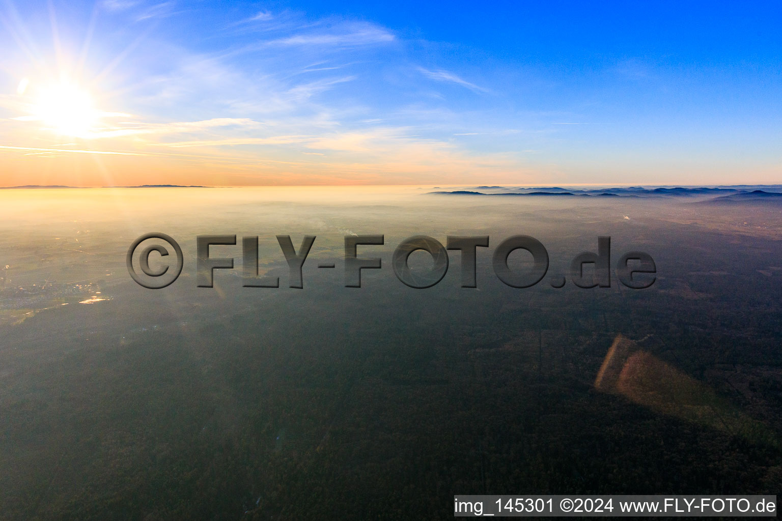 Rhine plain under the winter fog, only the Vosges stand out in Schleithal in the state Bas-Rhin, France