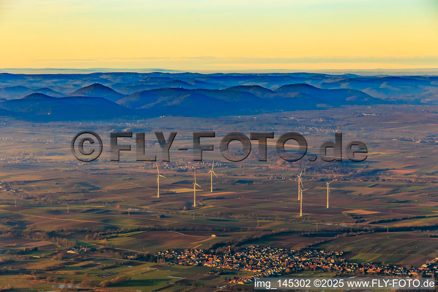 Wind farm in winter in Freckenfeld in the state Rhineland-Palatinate, Germany