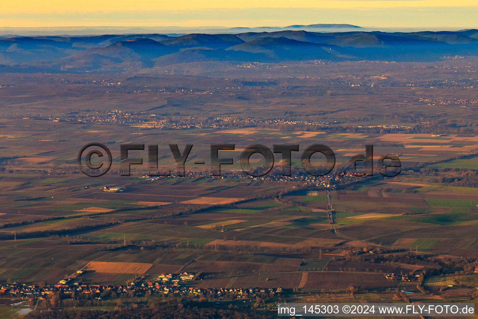 View of the town from the south in winter with a view to the Donnersberg in Winden in the state Rhineland-Palatinate, Germany