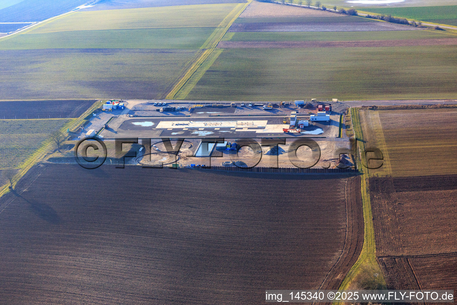 Construction site of the V20 deep drilling site of Vulcan Energy at Schleidberg for the extraction of geothermal energy and lithium in Insheim in the state Rhineland-Palatinate, Germany from a drone