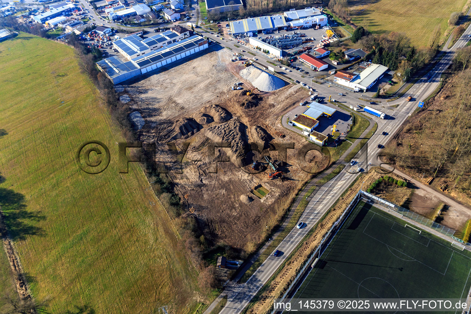 Oblique view of Construction site for the development of the new logistics park of HANSAINVEST and DFI-Real-Estate Kandel after demolition of the OBI market in the district Minderslachen in Kandel in the state Rhineland-Palatinate, Germany